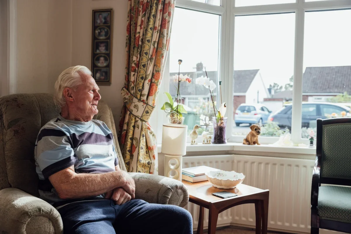 8 Signs It May Be Time for Assisted Living Guide for Families Senior man relaxing at home, reflecting signs it's time for assisted living and changing daily support needs